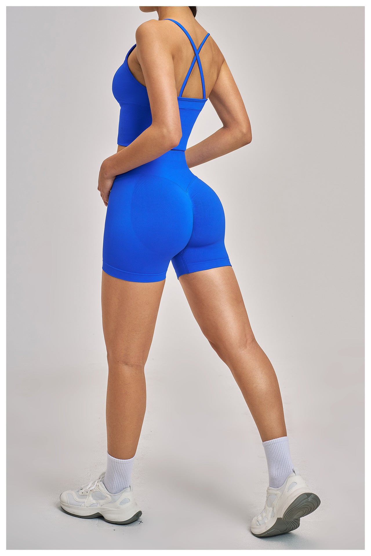 03/2026  Wholesale FOUREGG High-elastic running tracksuit with cross-back design, tight-fitting fitness wear, seamless yoga set for women, 5518