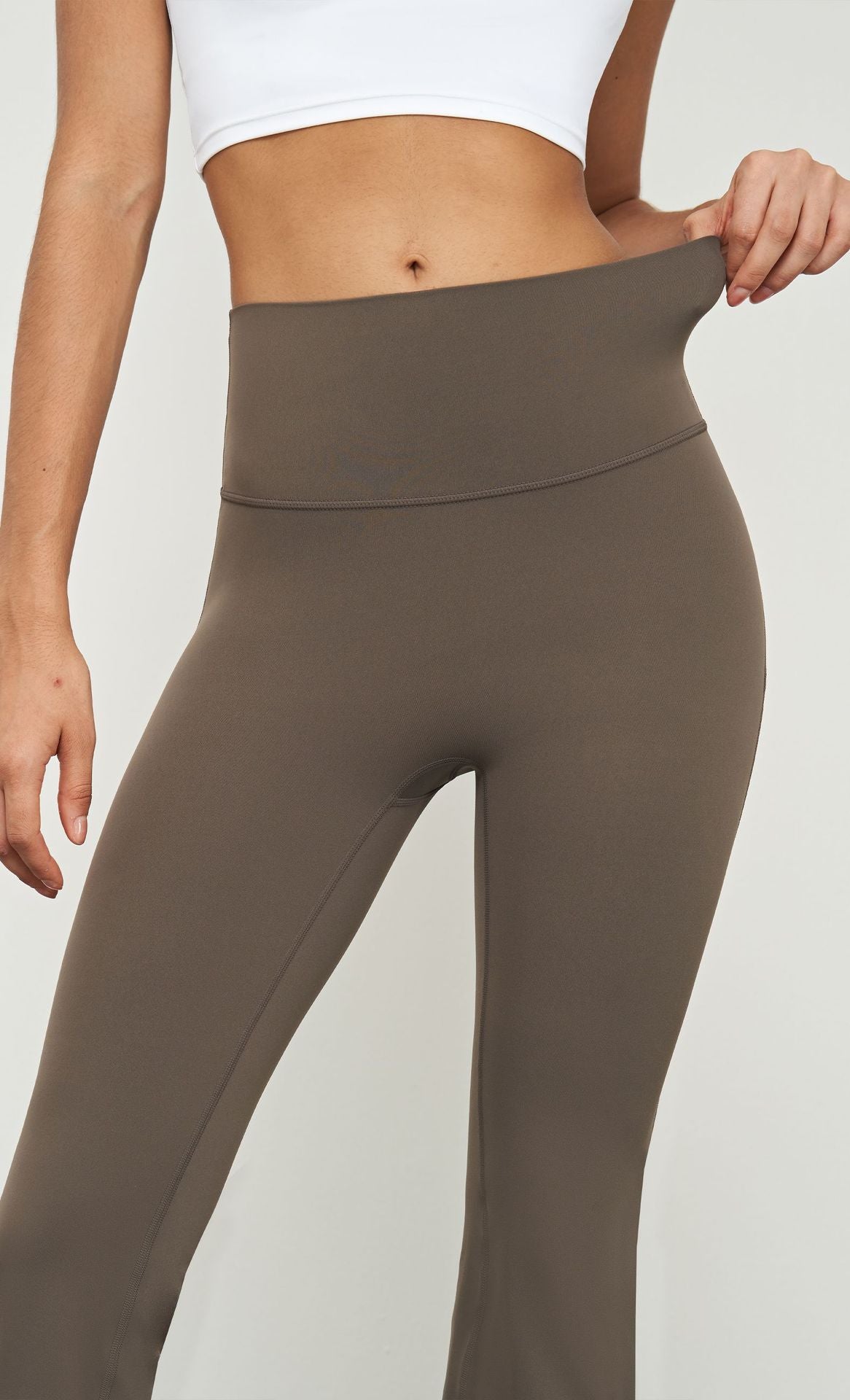 2023.08 NUF nude micro-flared yoga pants one-piece high-waisted abdomen sports pants female Pilates outerwear peach hip pants
