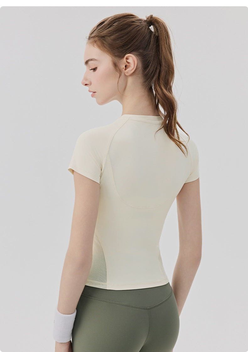 01/2026 Women's sweat-wicking, quick-drying sports T-shirt with cool mesh breathability, suitable for yoga, Pilates training, and fitness.