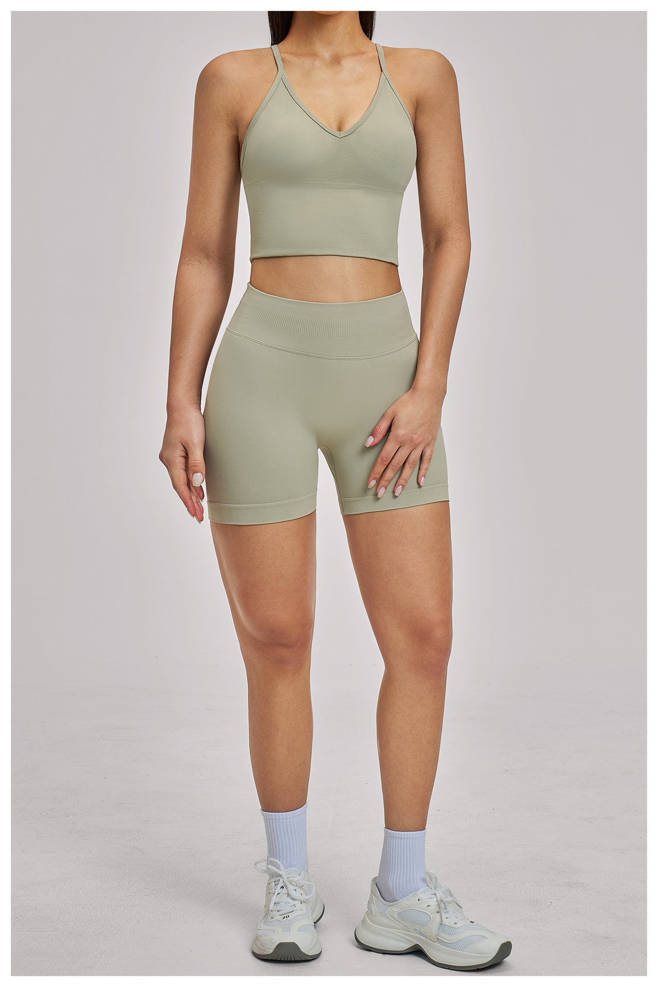 03/2026  Wholesale FOUREGG High-elastic running tracksuit with cross-back design, tight-fitting fitness wear, seamless yoga set for women, 5518