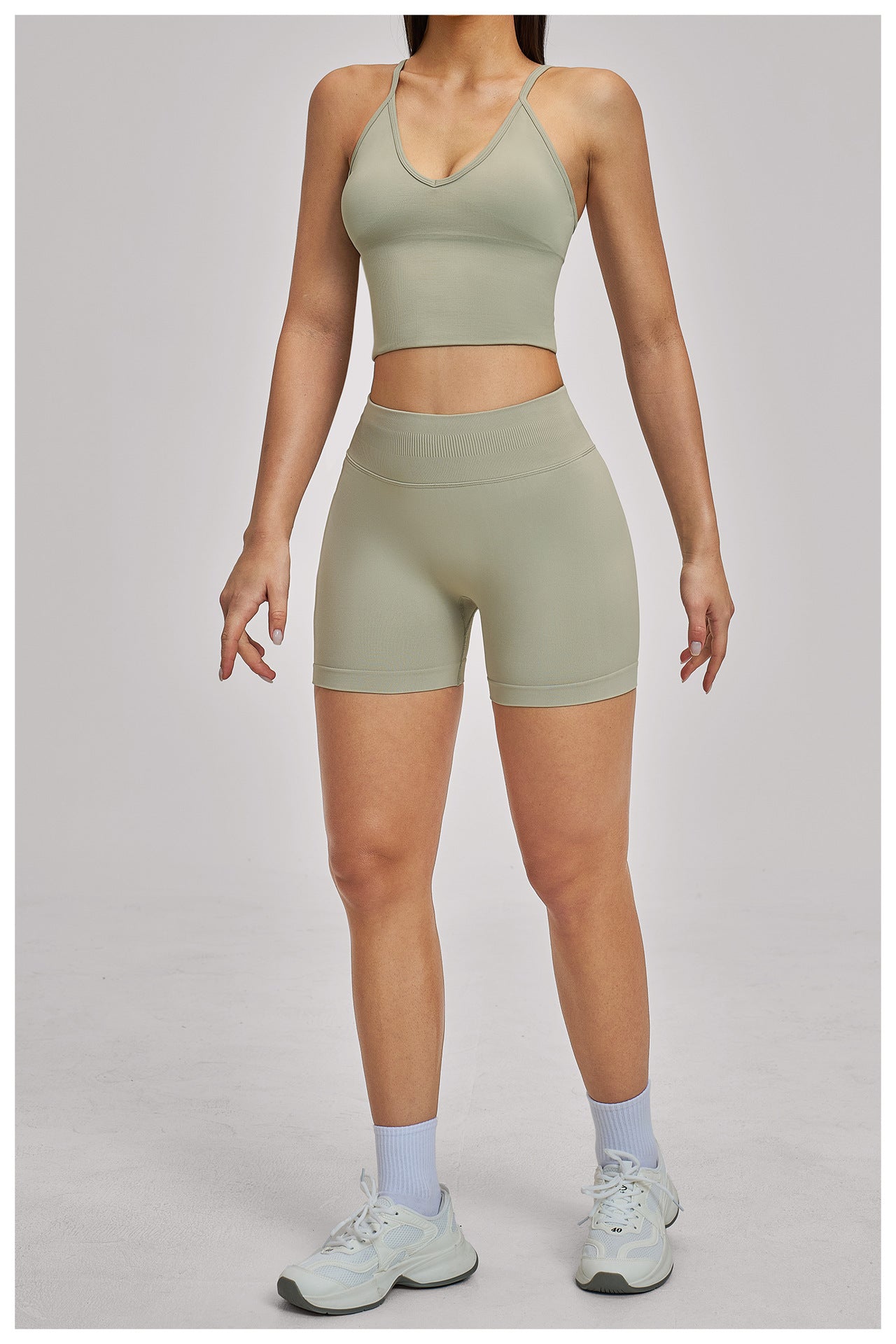 03/2026  Wholesale FOUREGG High-elastic running tracksuit with cross-back design, tight-fitting fitness wear, seamless yoga set for women, 5518