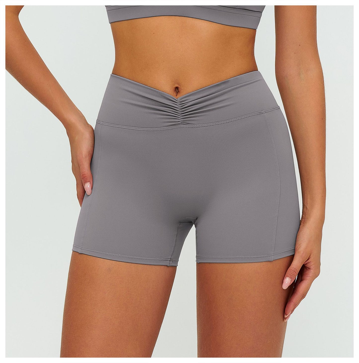 12/2025 Women's high-waisted, brushed yoga shorts with pleats and hip-lifting design, perfect for outdoor running and sports (style number 9313).