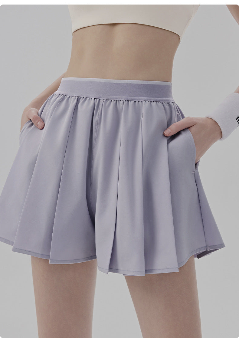 01/2026 Loose-fitting yoga shorts/pants, one-piece design, anti-exposure sports shorts, women's Pilates pleated skirt/pants with pockets