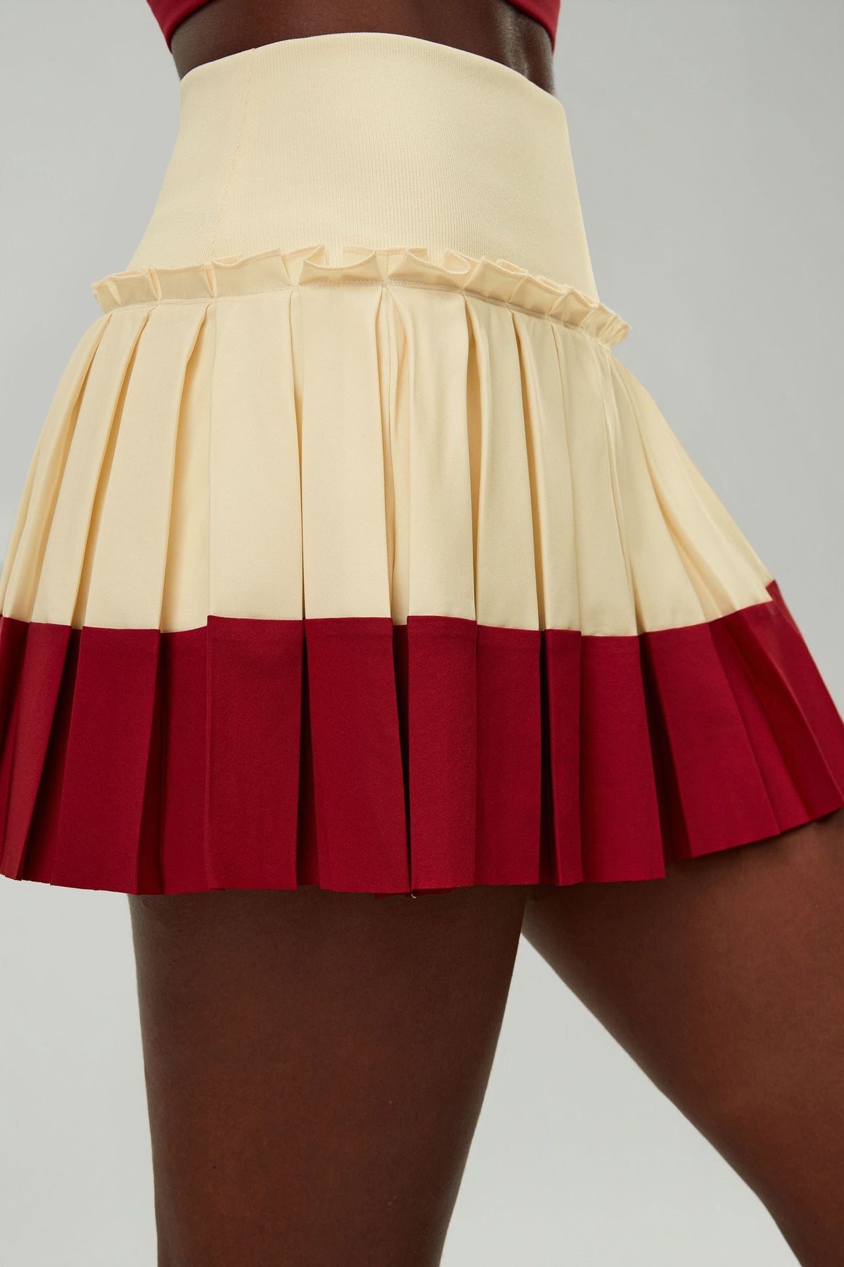 Wholesale Women's Puff-Edge Tennis Skirt Wholesale | Striped Polyester Sports Skirt | fouregg | SP670