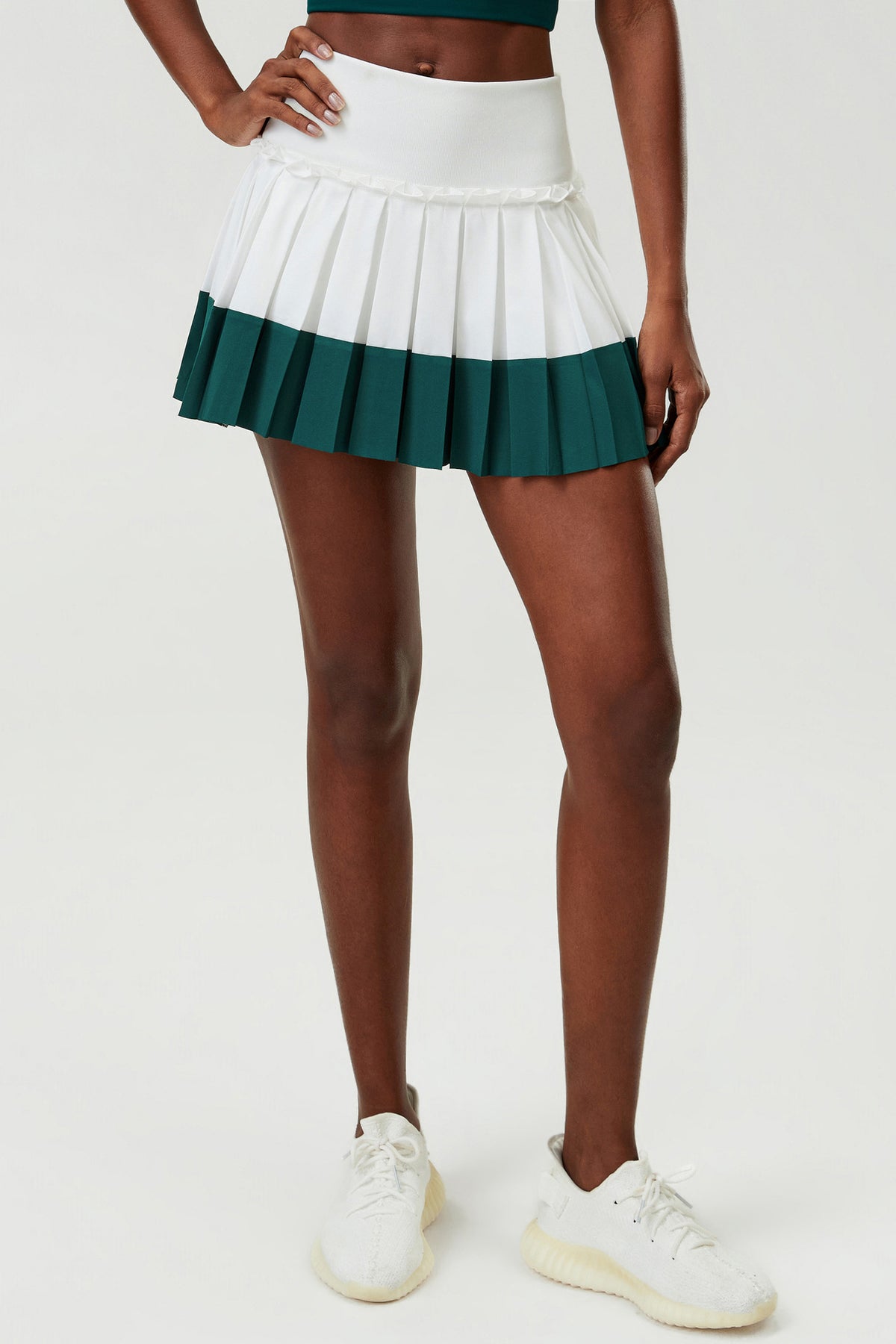 Wholesale Women's Puff-Edge Tennis Skirt Wholesale | Striped Polyester Sports Skirt | fouregg | SP670