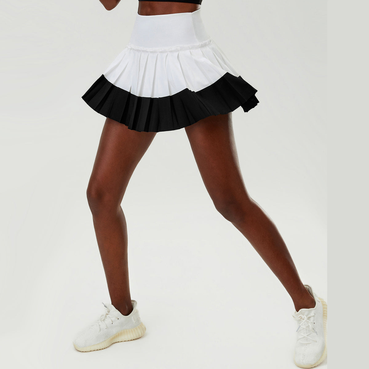 Wholesale Women's Puff-Edge Tennis Skirt Wholesale | Striped Polyester Sports Skirt | fouregg | SP670