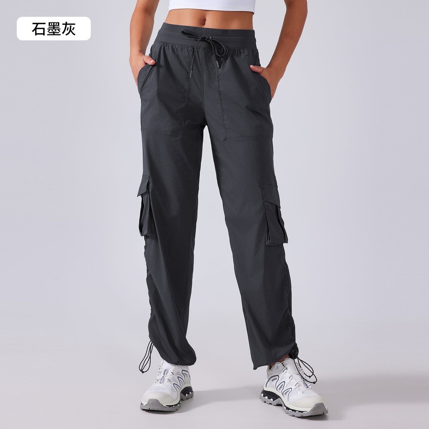 12/2024 New lightweight quick dry outdoor running pants women draw rope large pocket wide leg cargo casual pants D25001