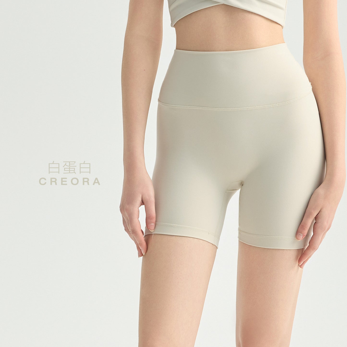 2024 nuevos colores 2022 primavera y verano nuevos pantalones cortos de tiro alto pantalones de yoga T-line nude para mujer pantalones de fitness de tres puntos tipo "levanta glúteos" estilo europeo y americano